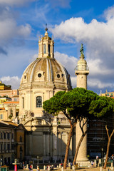 View of the Roman Forums, Trajan's Column and Church of the Holy Name of Mary. Santissimo Nome di...
