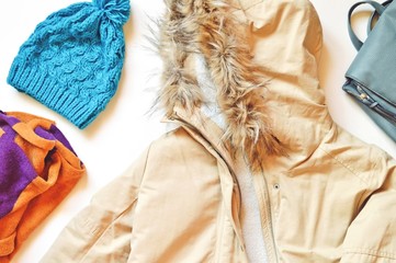 Stylish women's winter outerwear. Flat lay fashion photography
