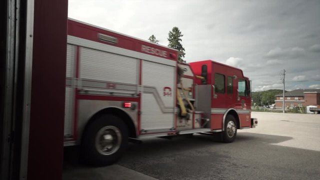 firetruck pulling out of the station