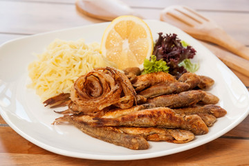 Fried fish with vegetables