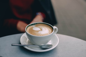 fresh cappuccino coffee with a pattern.