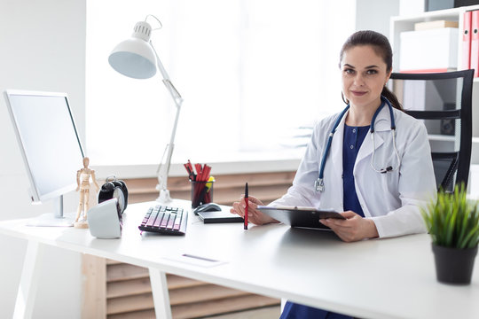 Portrait of a young girl in a white robe