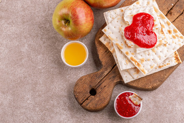 Traditional Jewish kosher matzo with apples, jam and honey