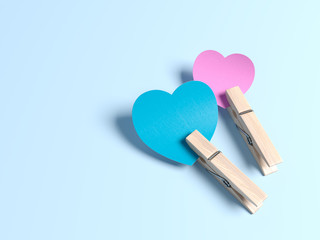 Concept of two colored hearts with clothes pins on floor. 3d illustration.