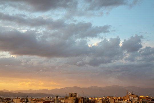 Sunset over a town in Greece