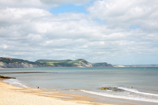 Person walking on the beach in England