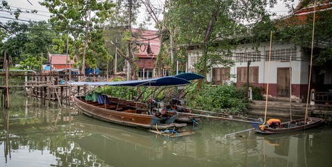 Fototapeta na wymiar Empty Canal Boats in residential area