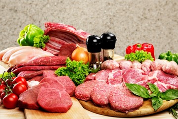 Fresh Raw Meat Background with vegetables