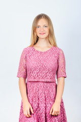 smiling girl model in pink dress