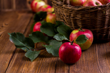 ripe apples on a wooden table in the garden