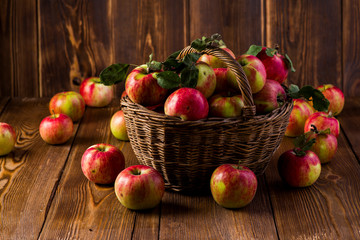 ripe red apples in a basket on the table