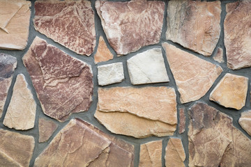 TEXTURE OF STONE WALL FOR BACKGROUND