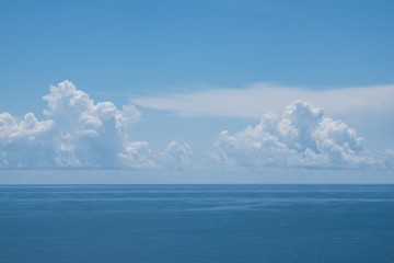 Fototapeta na wymiar BEAUTIFUL IMAGE OF THE SEA WITH WHITE CLOUD