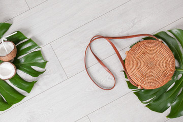 Flat lay composition with bamboo bag and space for text on wooden background