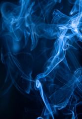 Abstract blue smoke swirls