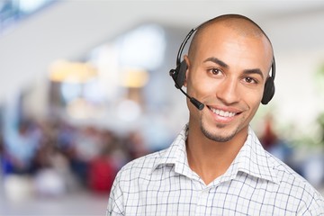Portrait of a smiling man with headset