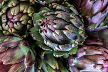 Fototapeta premium delicious colorful artichokes background