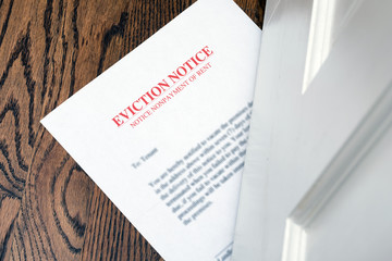 EVICTION NOTICE ON HARDWOOD FLOOR SLIPPED UNDER ENTRANCE DOOR