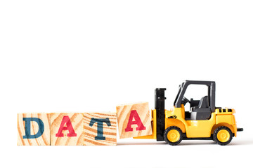 Toy forklift hold wood letter block A in word data on white background