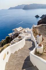 Stone steps to the blue sea, beautiful details of Santorini island