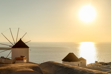 Windmill against colorful sunset, Santorini - obrazy, fototapety, plakaty