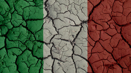 Political Crisis Or Environmental Concept: Mud Cracks With Italy Flag
