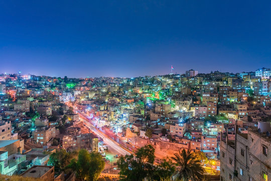 Cityscape Amman downtown at dusk, Panoramic view from the citadel hill. Capital of Jordan.