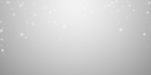 Sparse snowfall Christmas background. Subtle flyin