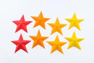 Obraz premium star made of paper the color of red orange yellow