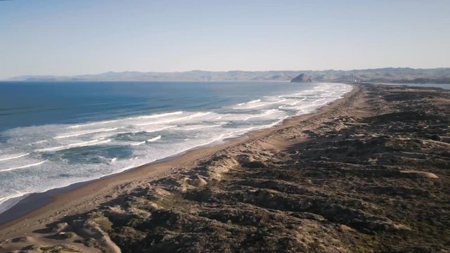 Montana de Oro State Park Beach and city of Morro Bay in the distance.