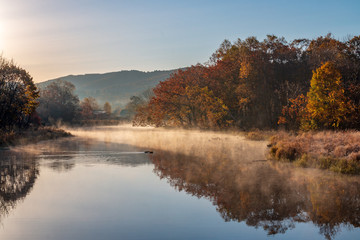 Autumn landscape of early foggy morning in the far east of Russia.
