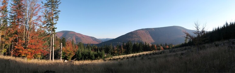 Indian summer in the woods with panorama view of summit of Muronka in Beskydy mountains in Czech Republic