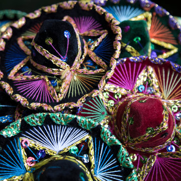 Isolated close up perspective of colorful Mexican sombreros