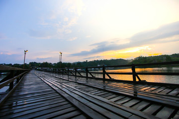 Fototapeta na wymiar Longest Wood bridge in Thailand,Mon Bridge at Sangkhlaburi. Kanchanaburi. Thailand