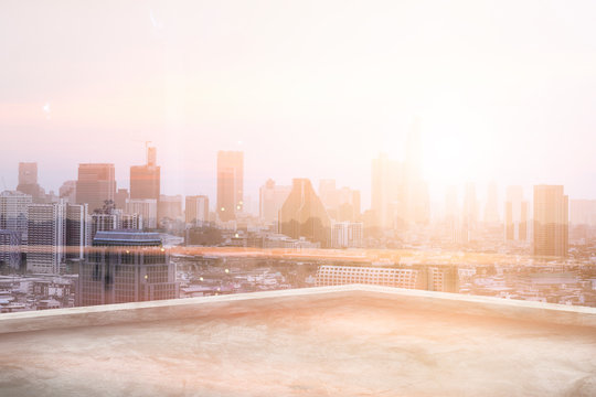 blank roof top of building with skyscraper landscape background