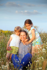 Portrait of   grandmother and two granddaughters