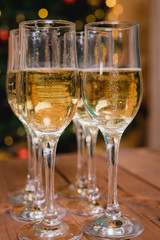 Christmas and New Year celebration with champagne. New Year holiday decor.