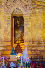 Patterns of golden sculptures and Buddhist architecture in South