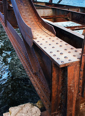 Old rusty bridge with rivets
