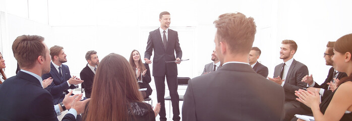 coach leads the session with the business team.