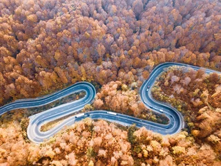 Foto op Aluminium Winding road from high mountain pass, in autumn season. © Rafaila Gheorghita