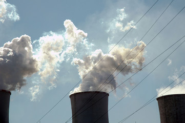 Steam Rises from Energy Company Chimney Stack