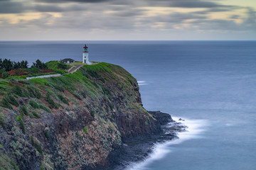 Fototapeta na wymiar Lighthouse on a cliff of Hawaii