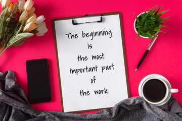 Inspirational and motivation life quote on clipboard with paper - The beginning is the most important part of the work.