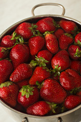 Strawberry clean in a pot of water