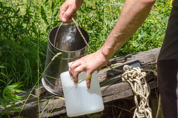 Take samples of water for laboratory testing. The concept - analysis of water purity, environment,...