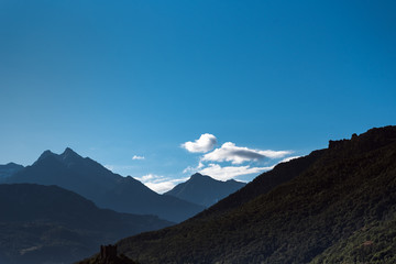 Mountain peaks and sky in Alps, Italy.