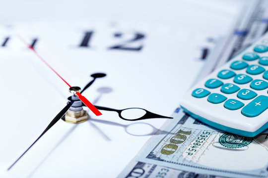 Money-dollars, clock and calculator. Time calculation money. 