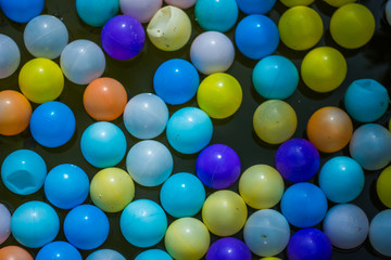 Colorful ball on the water