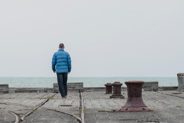 Man walking on Pier